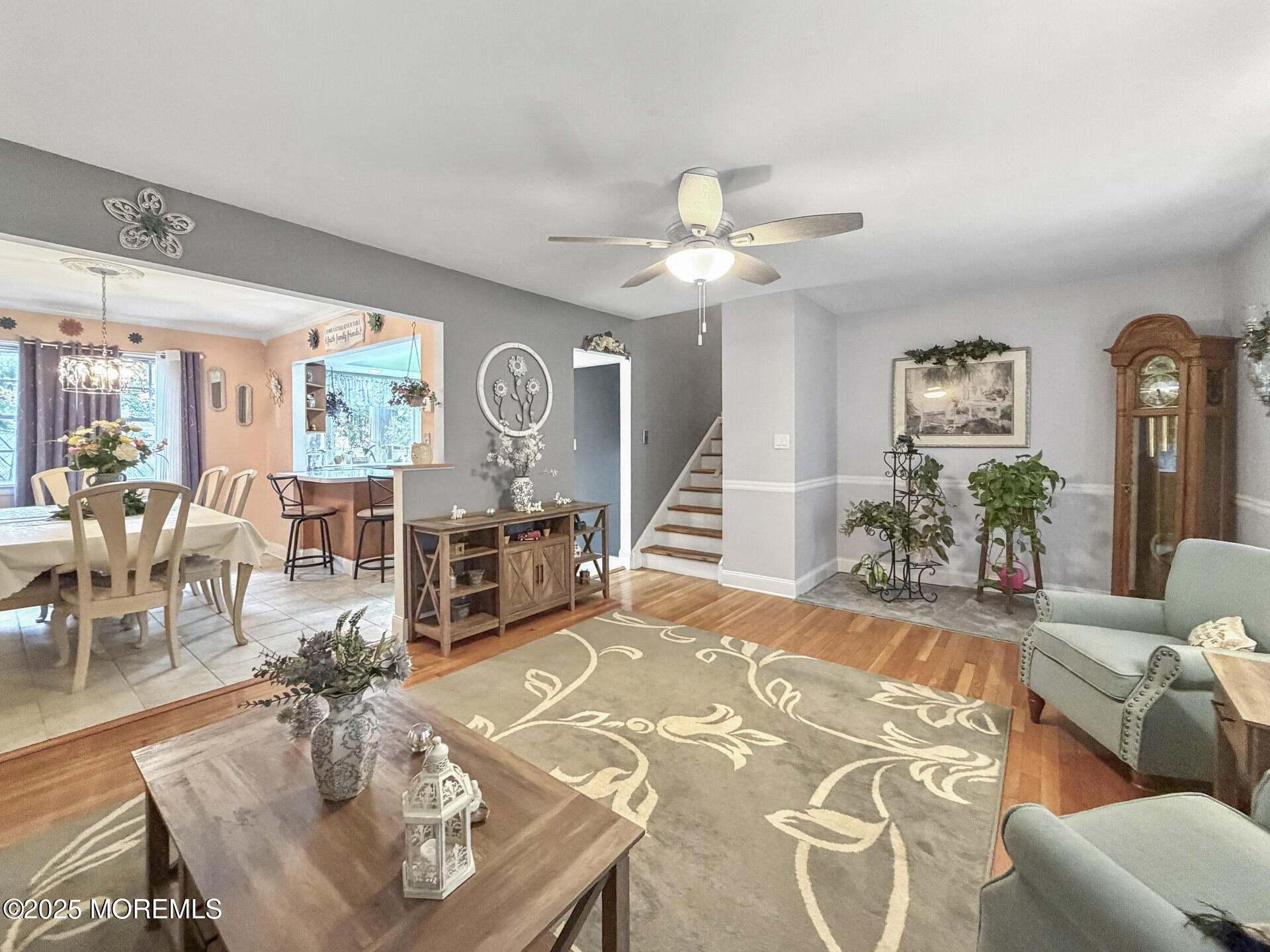 17 North Longview Road Howell, NJ 07731 - Photo 9 of 30 a living room with furniture a chandelier and a dining room