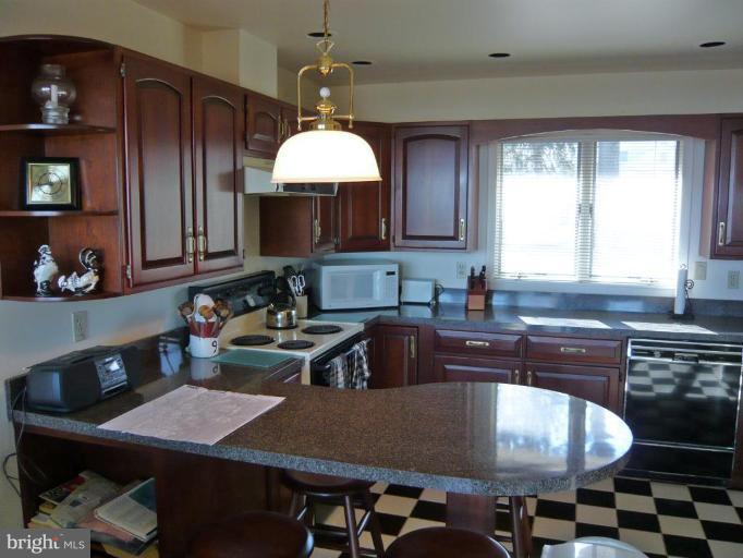1158 River Bay Road Annapolis, MD 21409 - Photo 12 of 23 Updated kitchen with breakfast bar