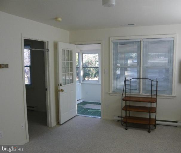 1158 River Bay Road Annapolis, MD 21409 - Photo 22 of 23 Guest quarters Living Room & covered entrance