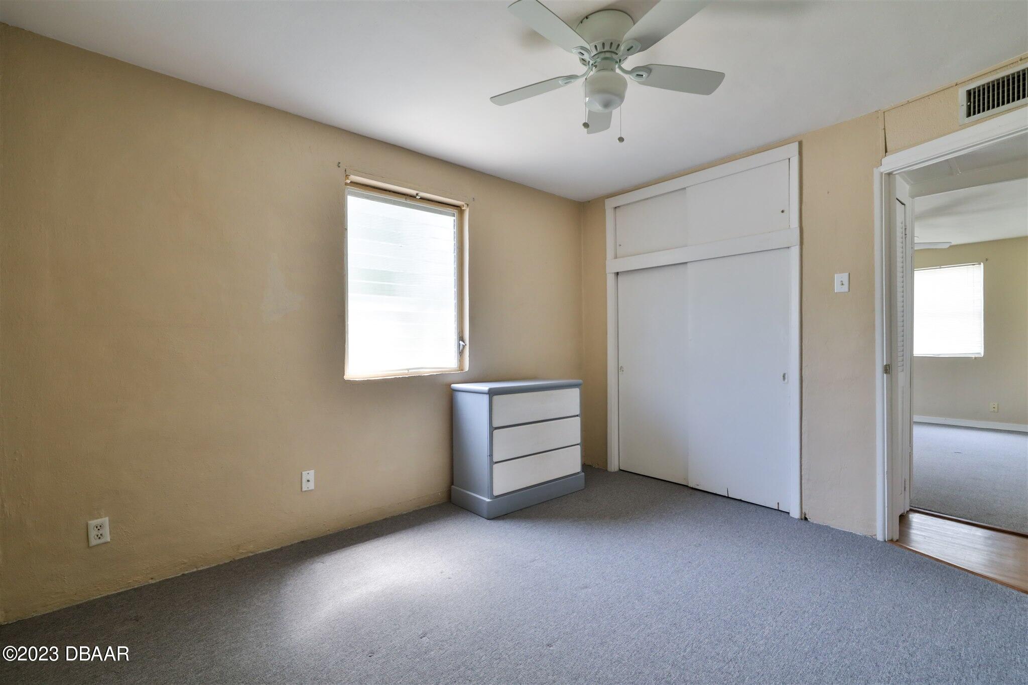 113 Evergreen Avenue Edgewater, FL 32132 - Photo 22 of 47 a view of an empty room with a window