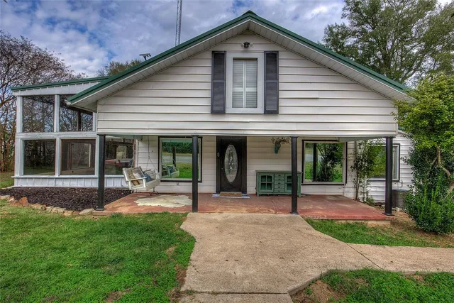 a kitchen with stainless steel appliances granite countertop a stove and cabinets