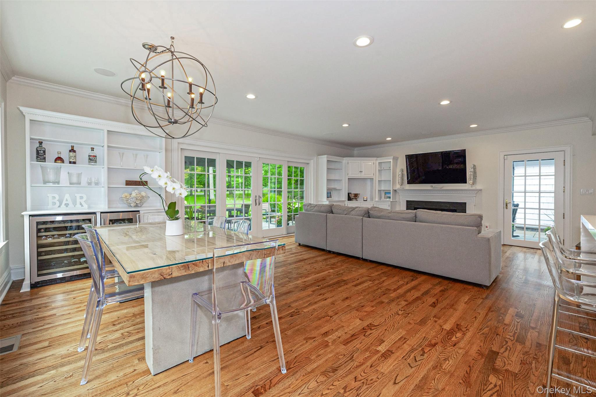 18 Lakeside Drive Rye, NY 10580 - Photo 15 of 43 a view of a dining room with furniture window and wooden floor