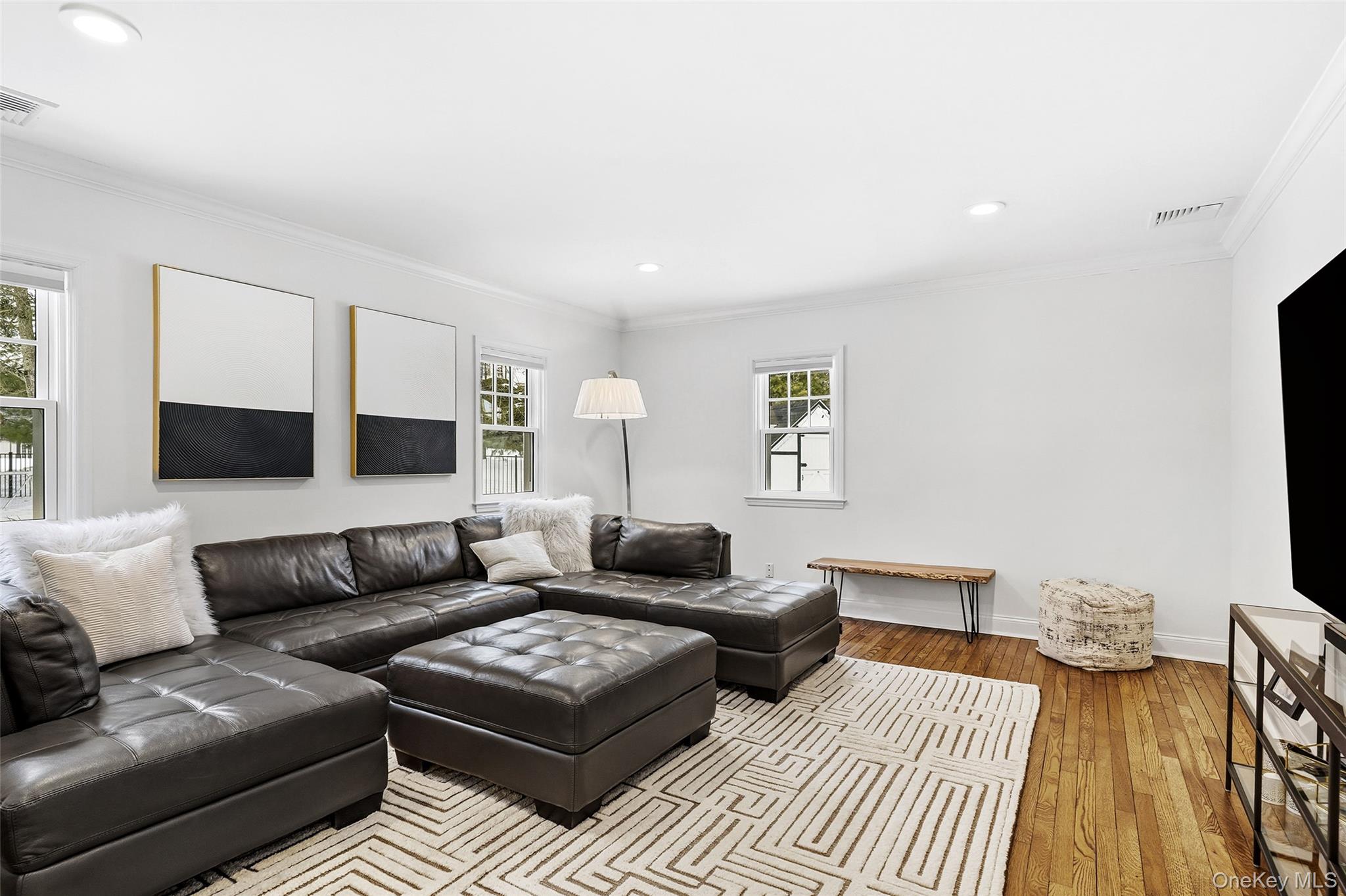 18 Lakeside Drive Rye, NY 10580 - Photo 31 of 43 a living room with furniture and a wooden floor