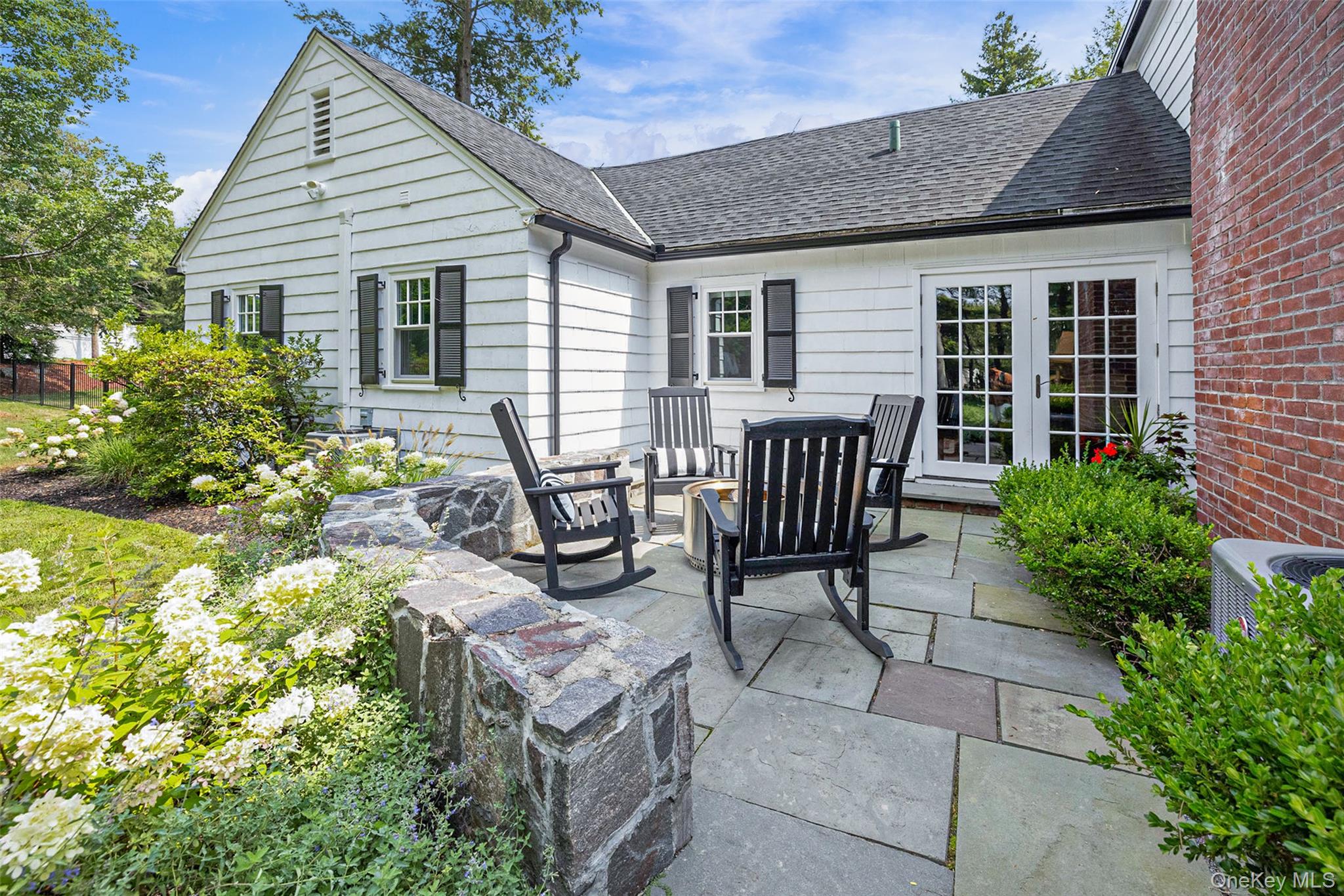 18 Lakeside Drive Rye, NY 10580 - Photo 37 of 43 a view of a house with backyard and sitting area