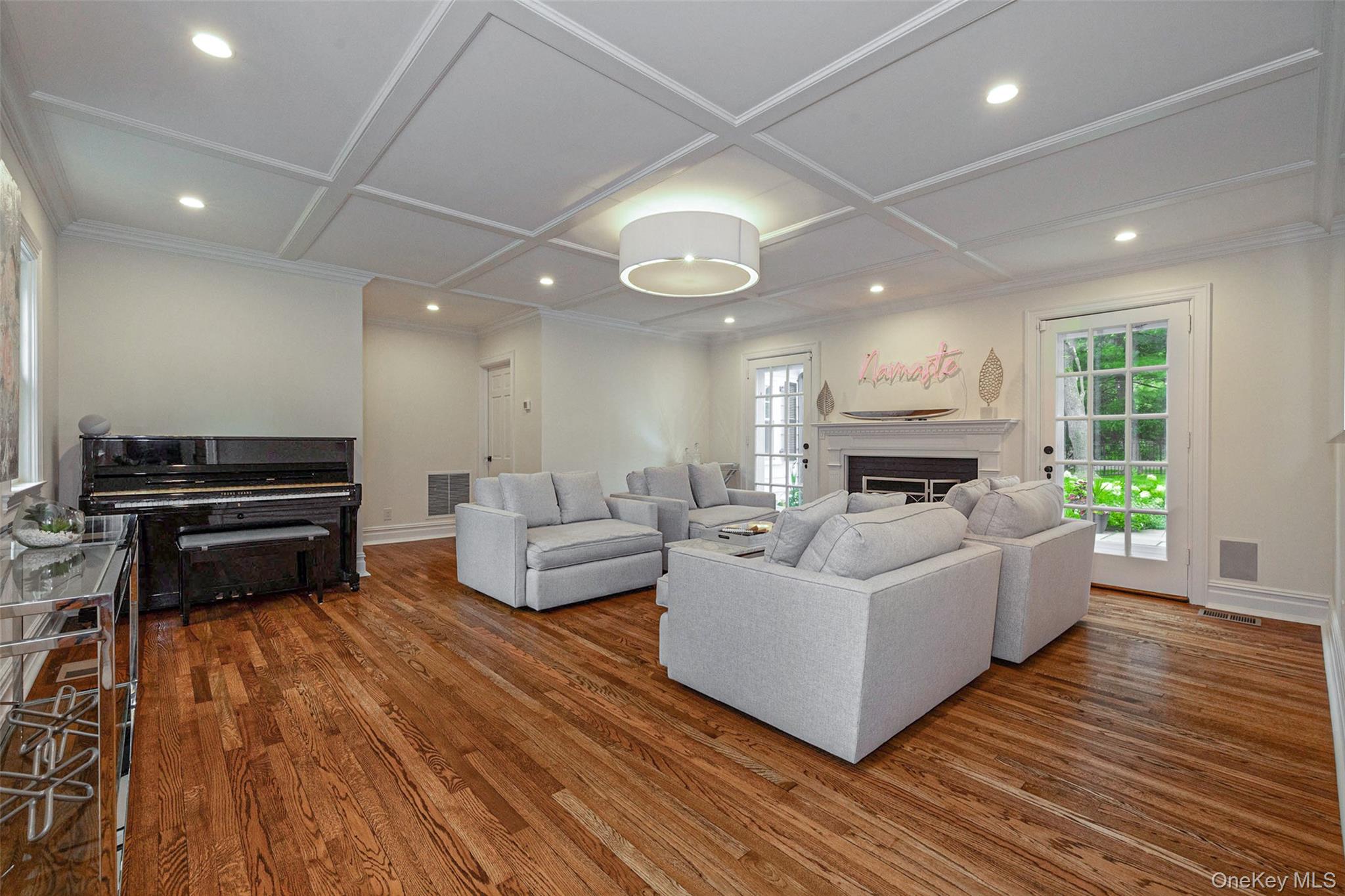 18 Lakeside Drive Rye, NY 10580 - Photo 8 of 43 a living room with furniture and a fireplace