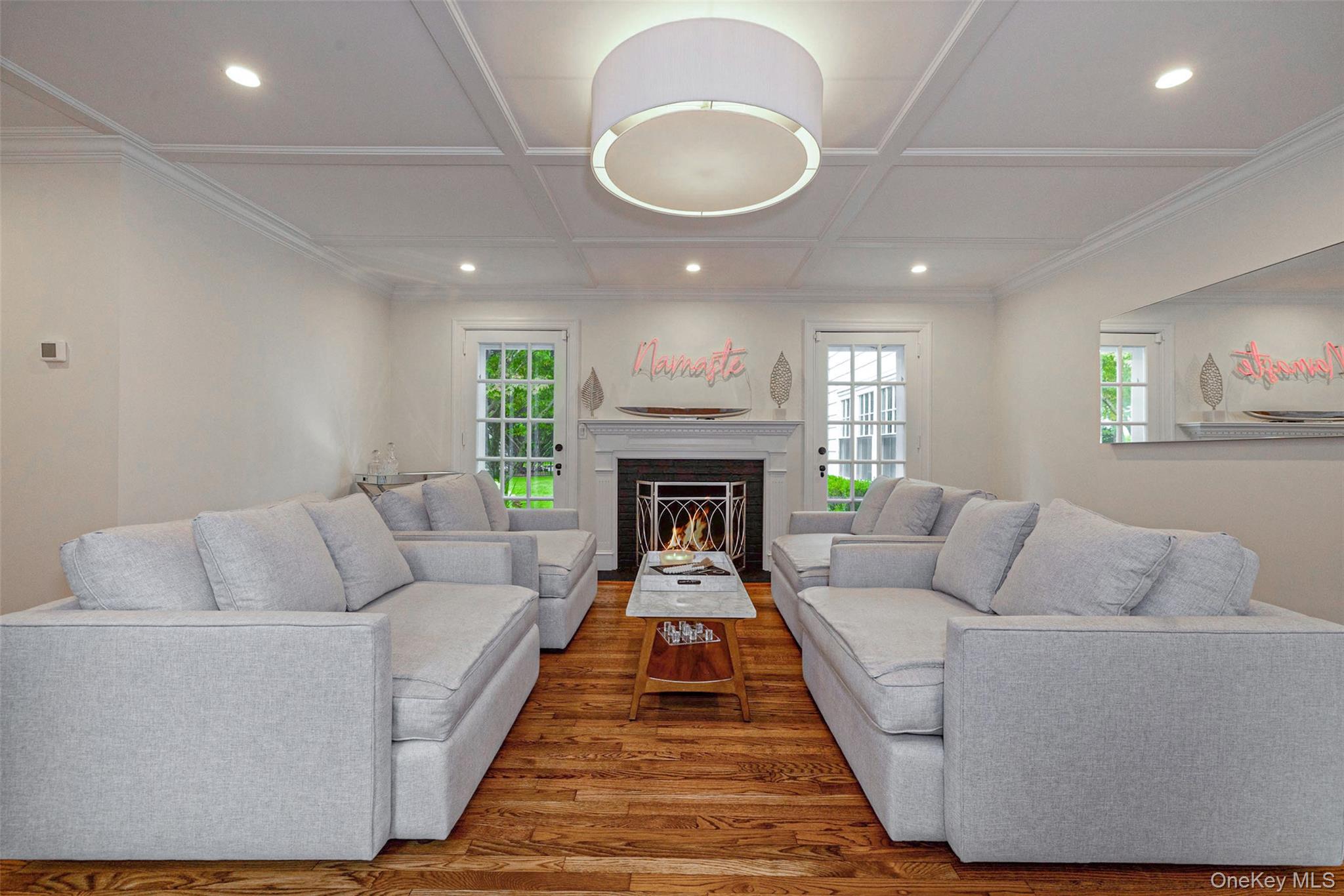 18 Lakeside Drive Rye, NY 10580 - Photo 9 of 43 a living room with furniture and a fireplace