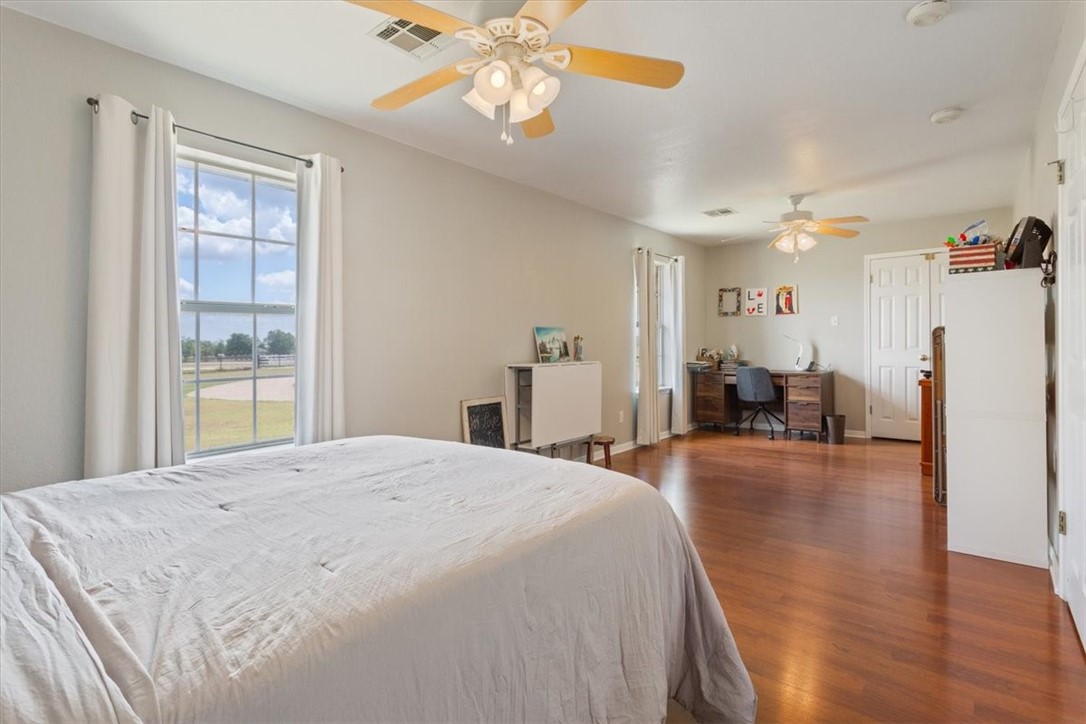 1045 Shiloh Trail China Spring, TX 76633 - Photo 23 of 35 a spacious bedroom with a bed and a window