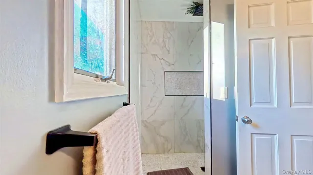 a room with furniture and a window