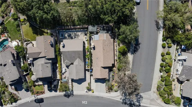 an aerial view of residential house and green space