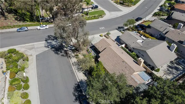 a view of a swimming pool with outdoor seating
