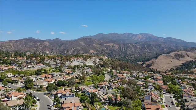 a view of a swimming pool with a slide and floor