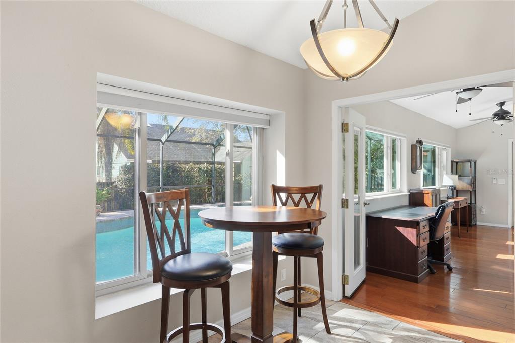 3488 Ridge Boulevard Palm Harbor, FL 34684 - Photo 11 of 30 a dining room with furniture and a window