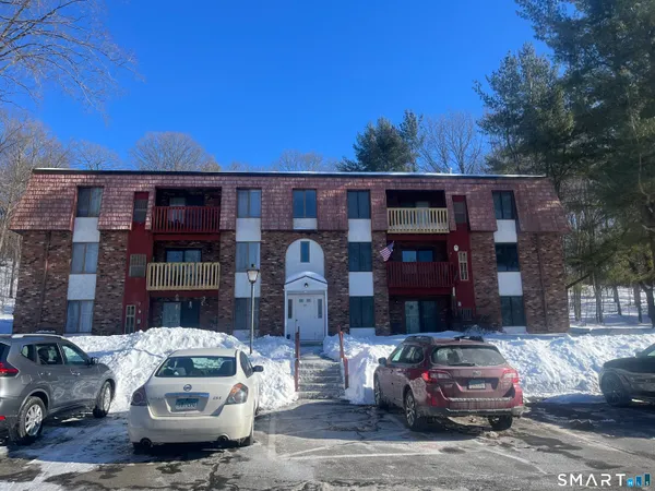 a car parked in front of a house