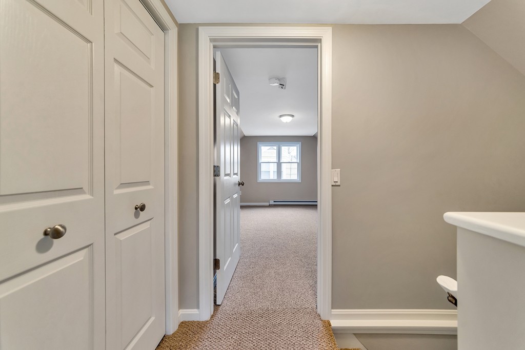 63 Haskin Street Springfield, MA 01109 - Photo 17 of 27 a view of a bathroom from a hallway
