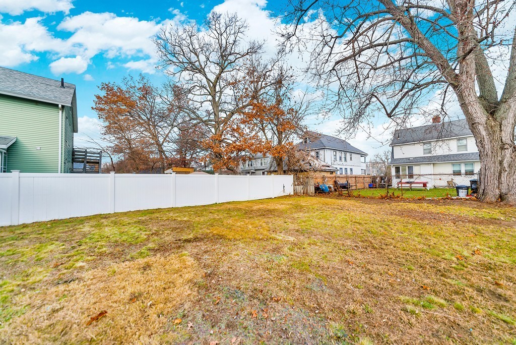 63 Haskin Street Springfield, MA 01109 - Photo 26 of 27 a view of residential houses with yard and swimming pool