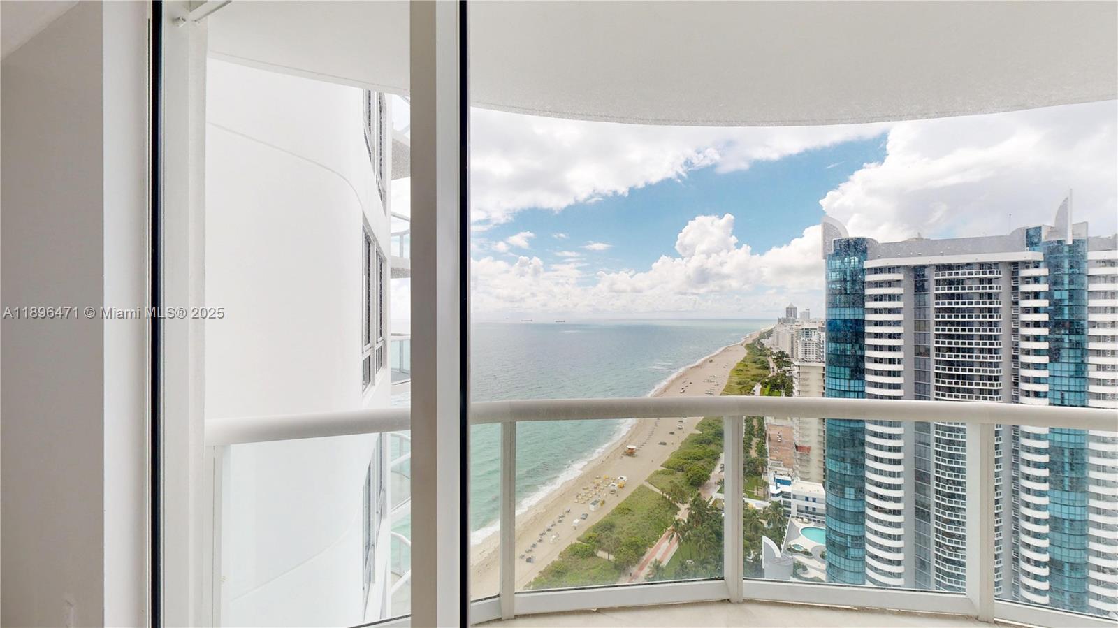 6365 Collins Avenue, Unit 2904 Miami Beach, FL 33141 - Photo 1 of 28 a view of a balcony from a window