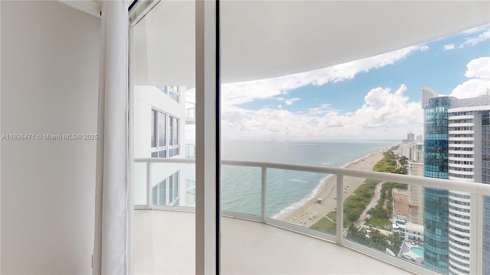 6365 Collins Avenue, Unit 2904 Miami Beach, FL 33141 - Photo 18 of 28 a view of balcony with furniture