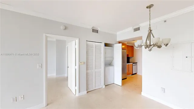 a view of a room with a storage & utility room