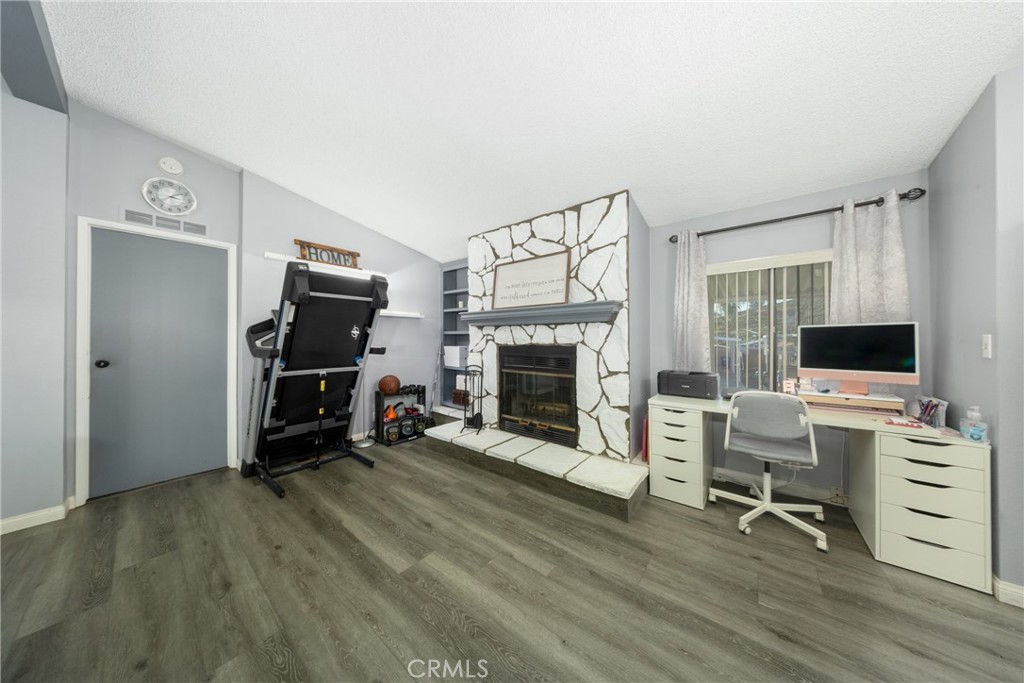 4080 Pedley Road, Unit 53 Jurupa Valley, CA 92509 - Photo 16 of 41 a view of a livingroom with furniture and a flat screen tv
