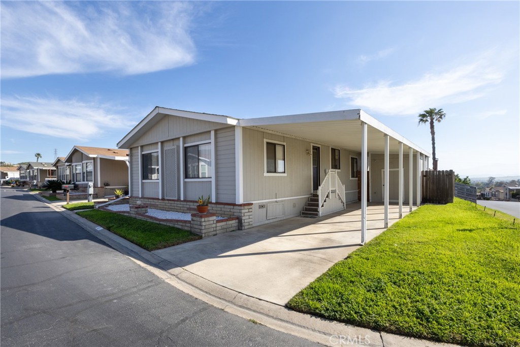 4080 Pedley Road, Unit 53 Jurupa Valley, CA 92509 - Photo 2 of 41 a front view of a house with garden