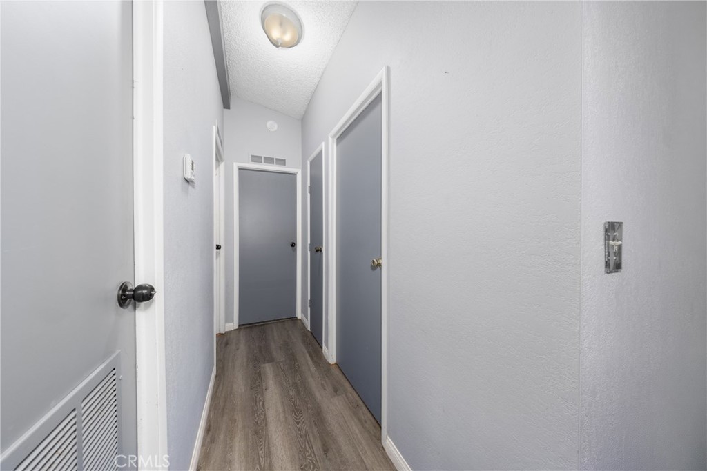 4080 Pedley Road, Unit 53 Jurupa Valley, CA 92509 - Photo 27 of 41 a view of a bathroom from a hallway