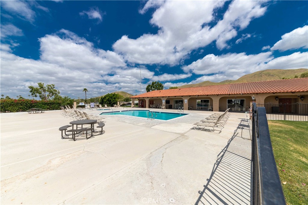 4080 Pedley Road, Unit 53 Jurupa Valley, CA 92509 - Photo 37 of 41 a view of a house with a yard
