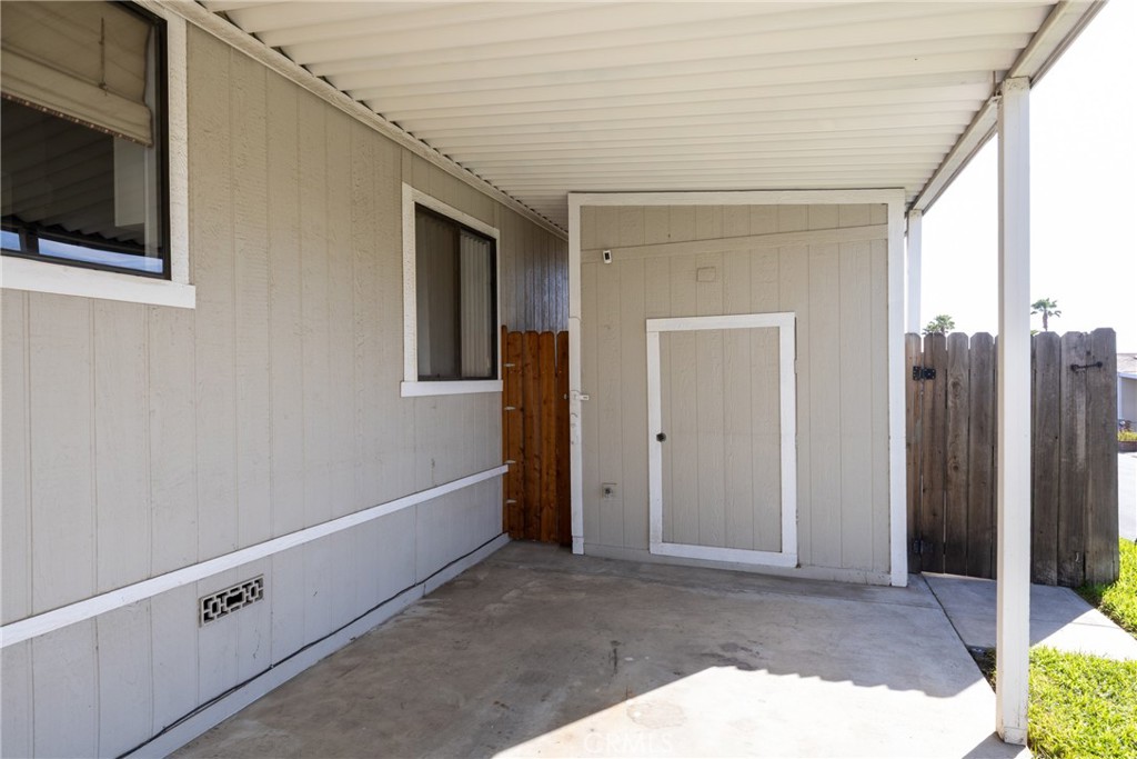 4080 Pedley Road, Unit 53 Jurupa Valley, CA 92509 - Photo 4 of 41 a view of an entryway with wooden floor