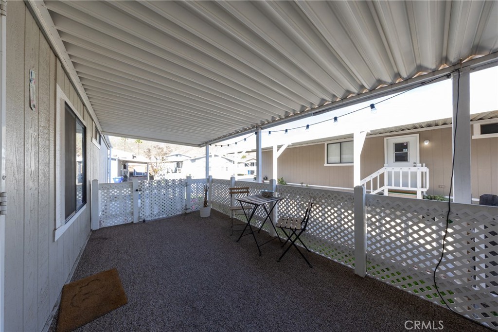 4080 Pedley Road, Unit 53 Jurupa Valley, CA 92509 - Photo 9 of 41 a view of a porch with furniture