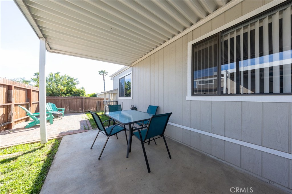 4080 Pedley Road, Unit 53 Jurupa Valley, CA 92509 - Photo 10 of 41 a view of a patio with a table and chairs