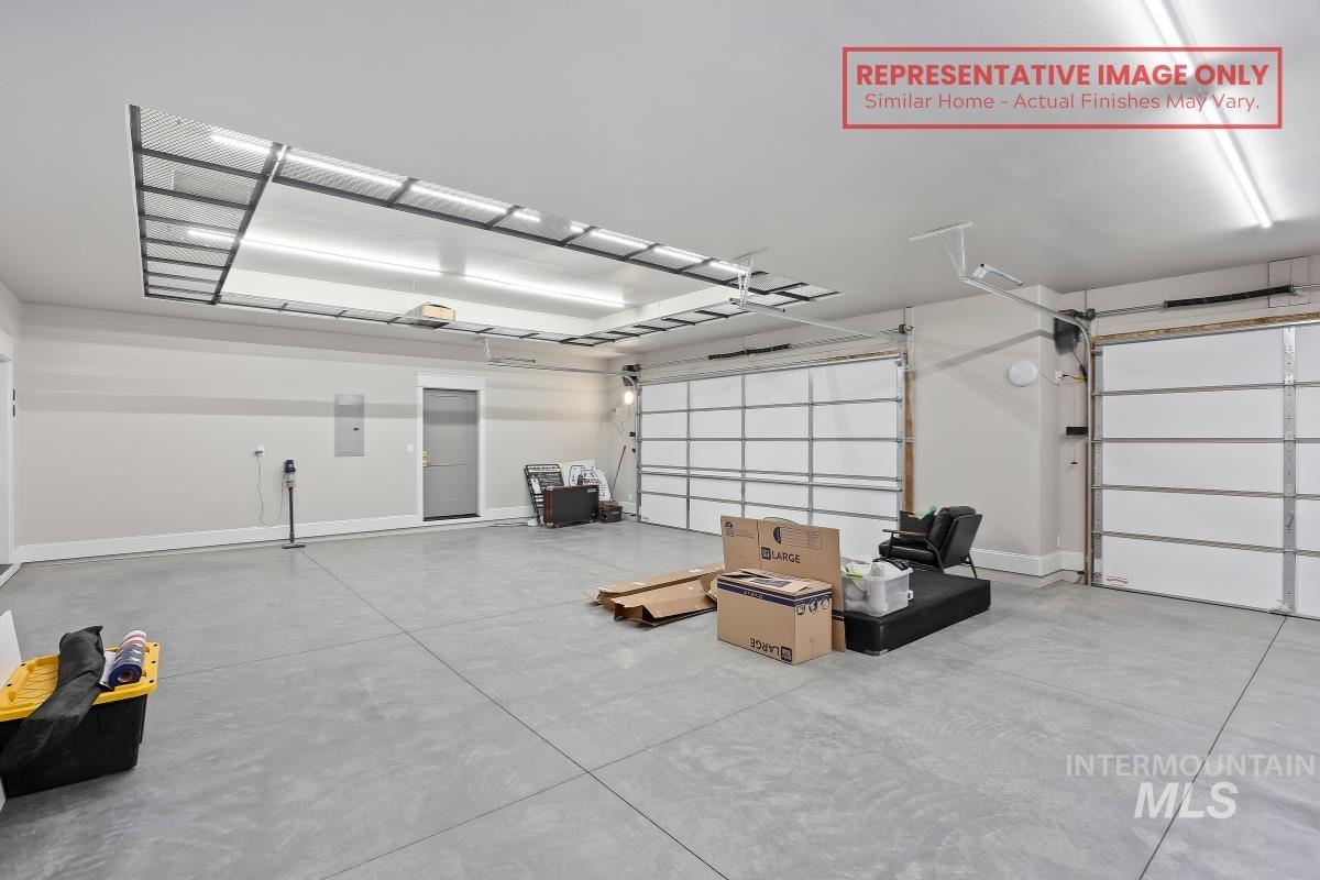 1513 Lavender Rupert, ID 83350 - Photo 13 of 16 Garage featuring electric panel and baseboards