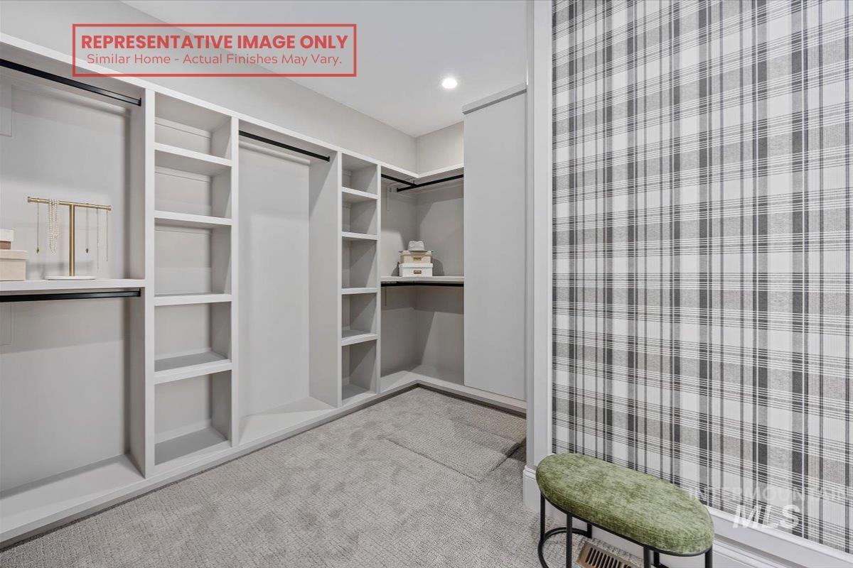 1513 Lavender Rupert, ID 83350 - Photo 7 of 16 Walk in closet featuring light colored carpet