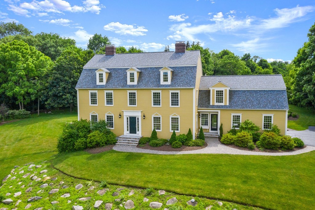 181 Maple Street Sherborn, MA 01770 - Photo 1 of 41 a front view of a house with a yard