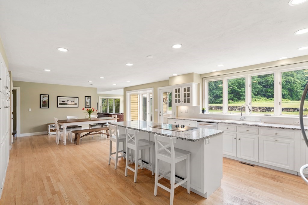 181 Maple Street Sherborn, MA 01770 - Photo 11 of 41 a view of a dining room with furniture and wooden floor
