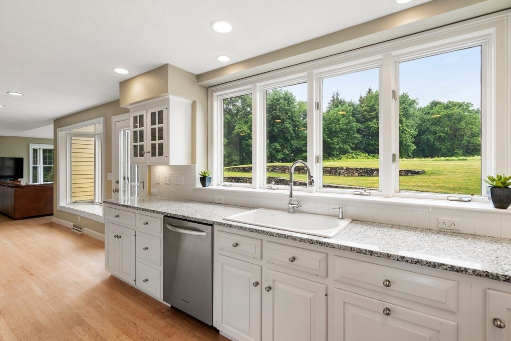 181 Maple Street Sherborn, MA 01770 - Photo 13 of 41 a kitchen with a sink and large window