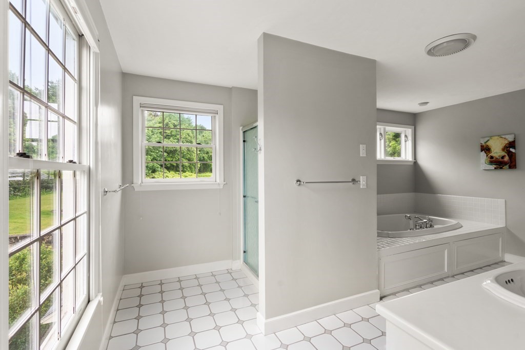 181 Maple Street Sherborn, MA 01770 - Photo 25 of 41 a bathroom with a sink toilet and shower