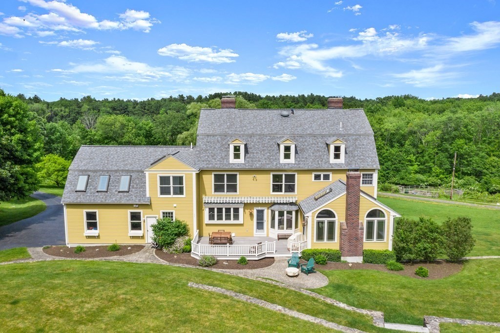 181 Maple Street Sherborn, MA 01770 - Photo 3 of 41 front view of a house with a yard