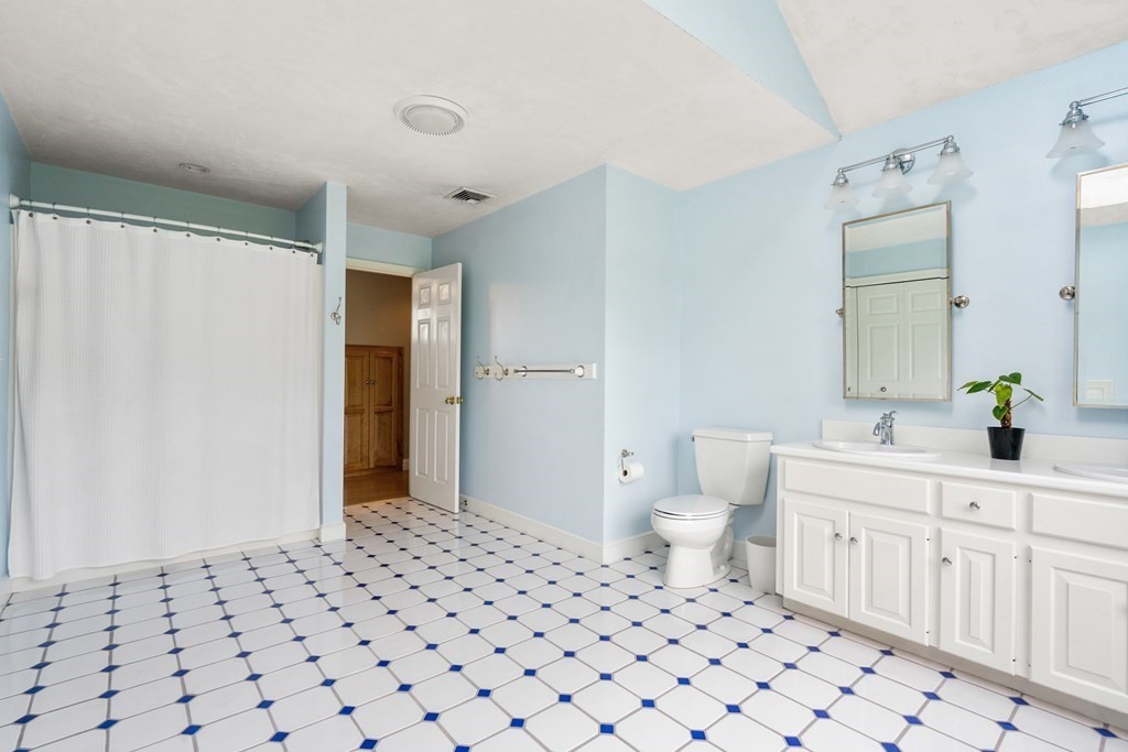 181 Maple Street Sherborn, MA 01770 - Photo 31 of 41 a bathroom with a sink toilet and shower