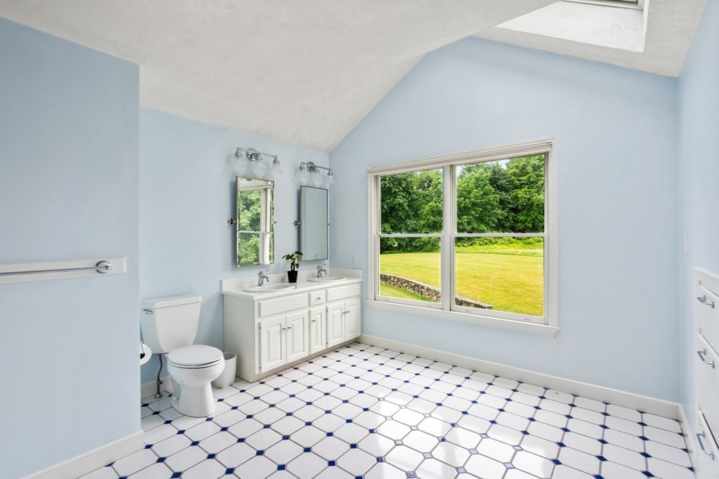 181 Maple Street Sherborn, MA 01770 - Photo 32 of 41 a large white room with a large window and furniture