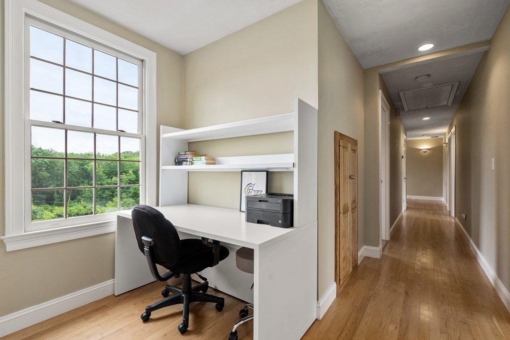 181 Maple Street Sherborn, MA 01770 - Photo 36 of 41 a view of a workspace with furniture and a window
