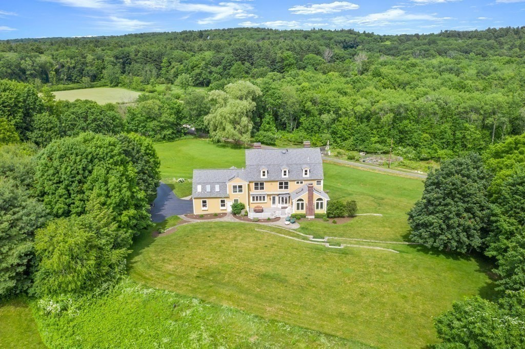 181 Maple Street Sherborn, MA 01770 - Photo 38 of 41 a view of a big yard with large trees