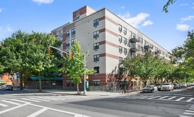 a view of a building with a street