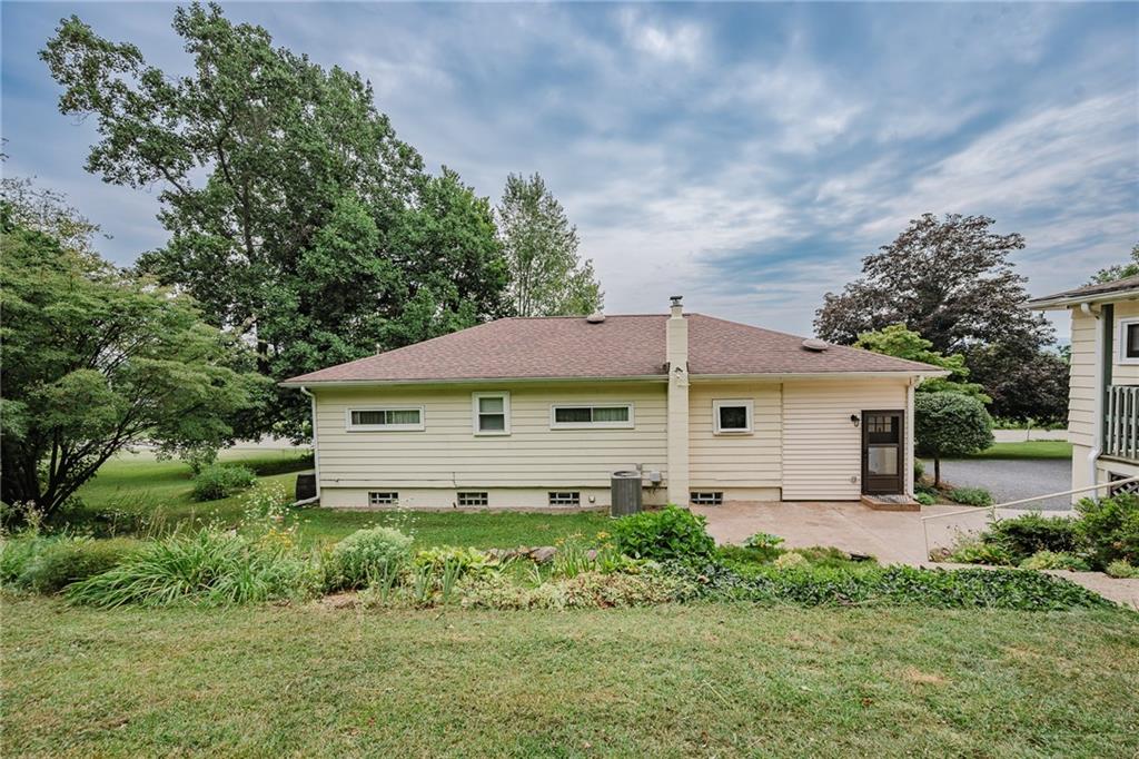145 Hood School Road Indiana, PA 15701 - Photo 11 of 46 a view of a house with a big yard and large trees