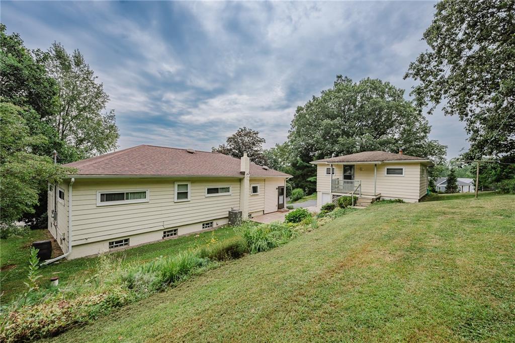 145 Hood School Road Indiana, PA 15701 - Photo 12 of 46 a front view of a house with a garden