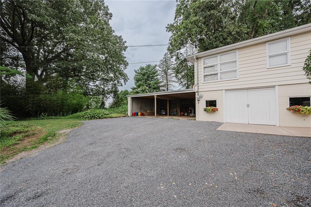 145 Hood School Road Indiana, PA 15701 - Photo 15 of 46 a view of a house with a yard and large tree