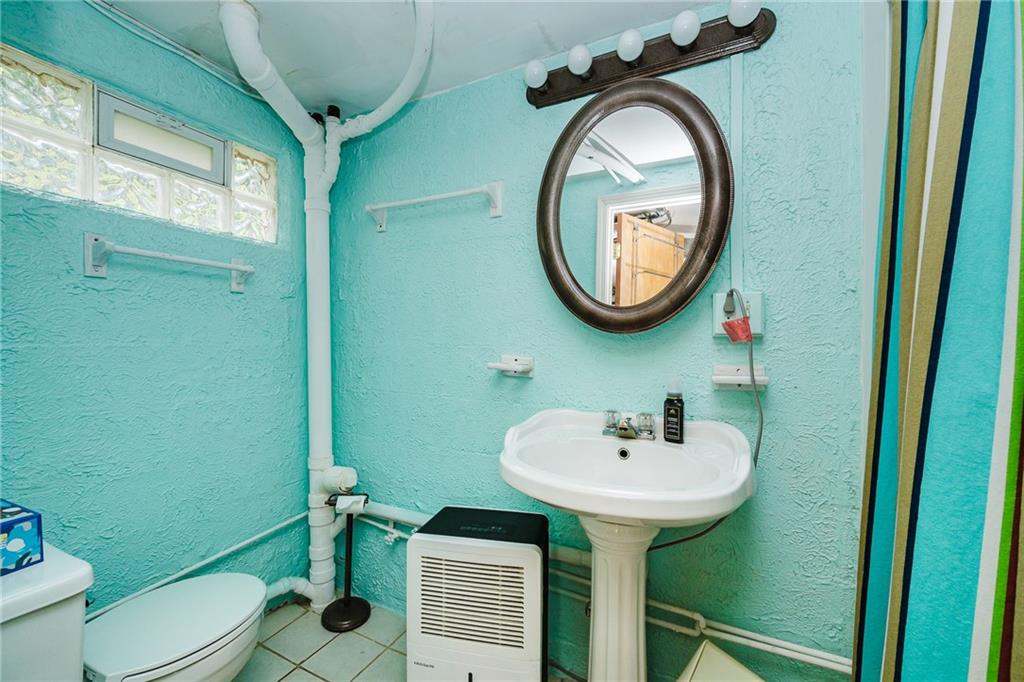 145 Hood School Road Indiana, PA 15701 - Photo 23 of 46 a bathroom with a toilet sink and mirror