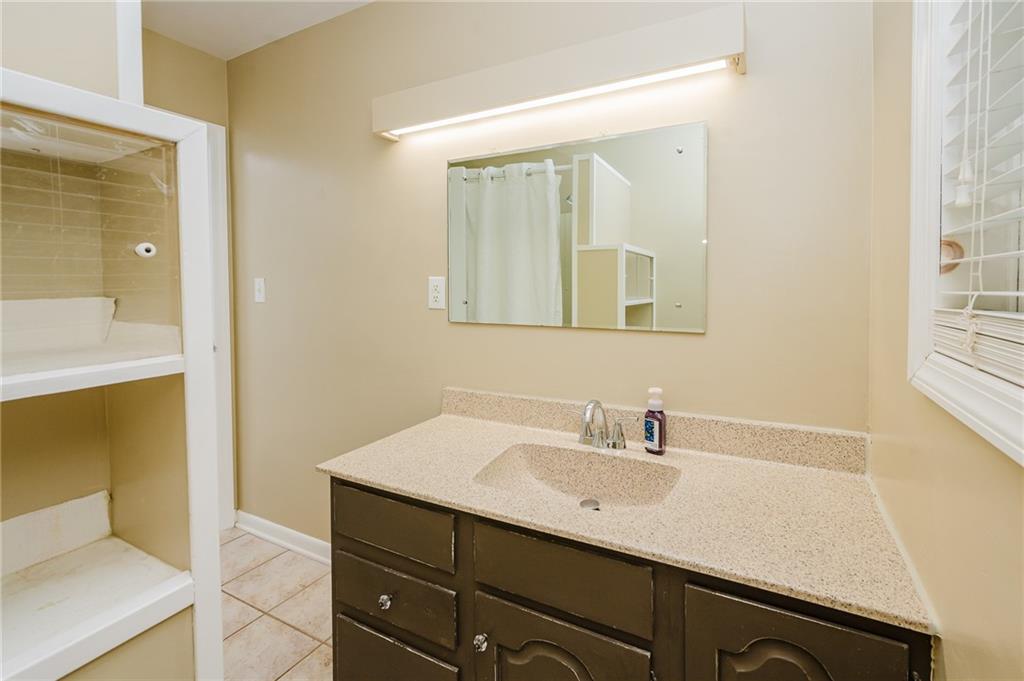 145 Hood School Road Indiana, PA 15701 - Photo 37 of 46 a bathroom with a sink a mirror and a toilet