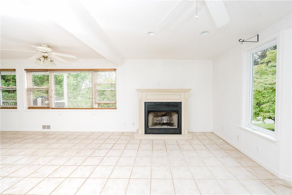 145 Hood School Road Indiana, PA 15701 - Photo 46 of 46 an empty room with windows and fireplace
