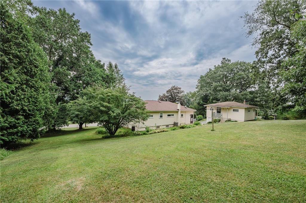 145 Hood School Road Indiana, PA 15701 - Photo 8 of 46 a tall house with a yard