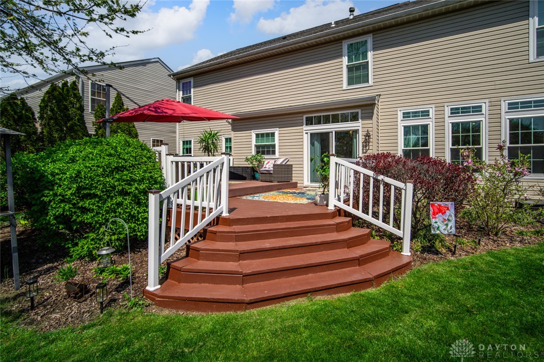 55 Janney Lane Springboro, OH 45066 - Photo 12 of 38 This spacious backyard features a multi-tiered deck, perfect for outdoor enjoyment and entertaining.