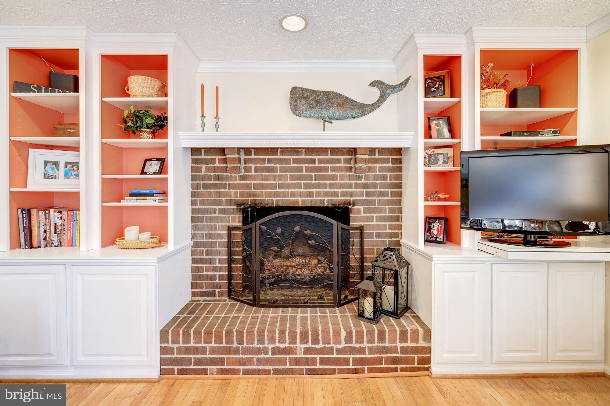 1390 Concord Point Lane Reston, VA 20194 - Photo 10 of 49 Handsome built-ins and brick fireplace with mantle